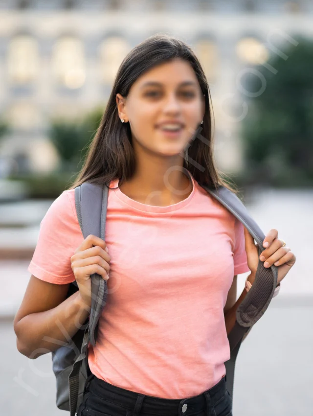 Shanaya college girl escort service in bangalore wearing pink tishirt and carry a bag on a shoulder in Bangalore