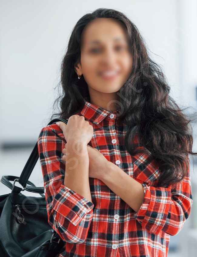 College Call girl Escort Elaira wearing check shirt and carry college bag in Hyderabad 