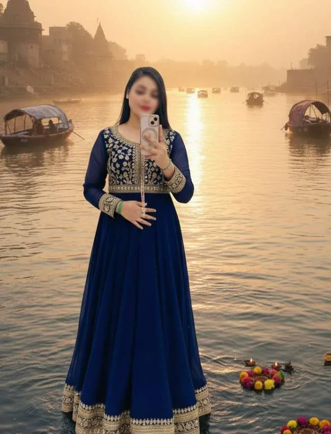 Independent Escort Jivika wearing lenga and taking selfi in river ganaga in Rishikesh