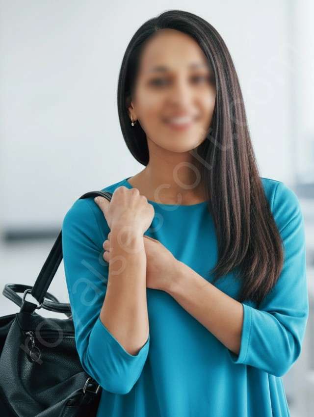 Lavika college escort and call girl wearing sky blue colour top and holding colledge bag in Mussoorie