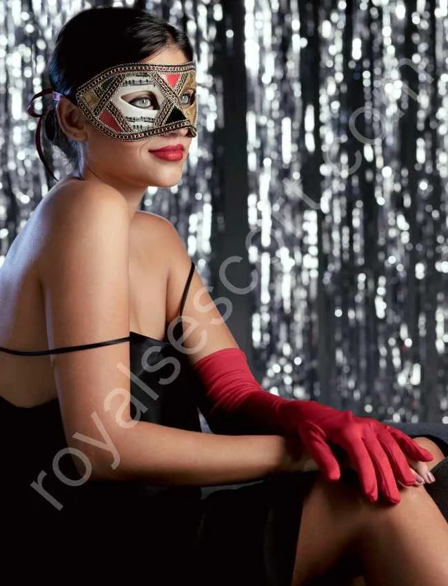 Independent Model Escort Liyana sitting on chair wearing mask in rishikesh